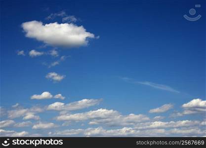Peaceful clouds in blue sky.
