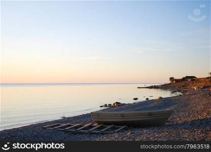 Peaceful coastline in a calm bay at evening by the coast of the swedish island Oland