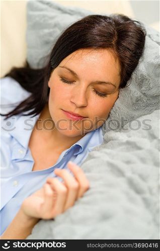 Peaceful portrait of woman sleeping on pillow