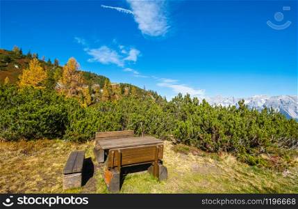 Peaceful sunny day autumn Alps mountain view and resting place. Reiteralm, Steiermark, Austria.