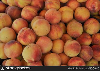 peach fruit food background. orange peach (Prunus persica) fruit vegetarian food useful as a background