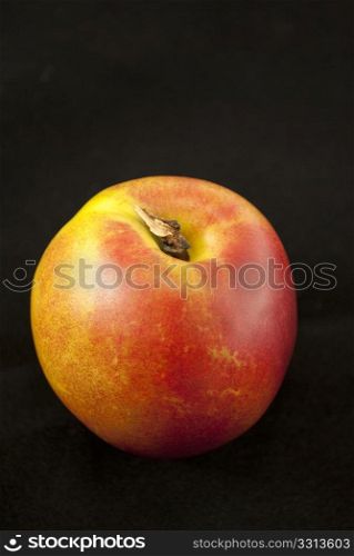 Peach on black background