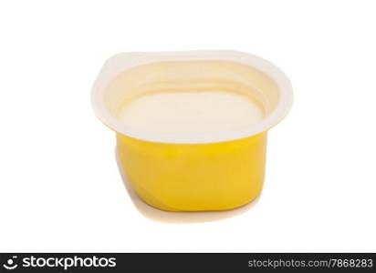 Peach yoghurt in open plastic cup isolated on white