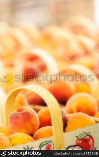 Peaches in baskets, close-up