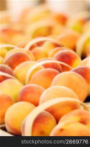 Peaches in baskets, close-up
