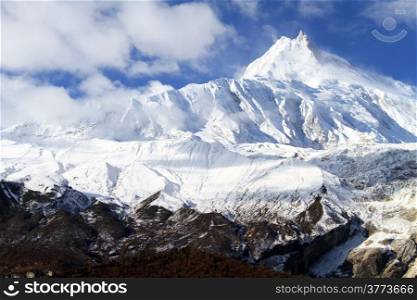 Peaks of Manaslu and snow in Nepal