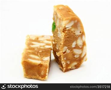 Peanut brittle isolated on white background