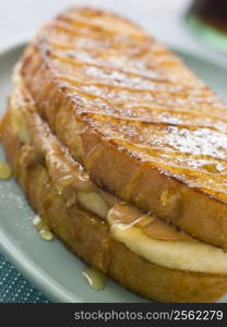 Peanut Butter And Banana Eggy Bread Sandwich With Syrup