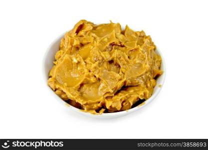 Peanut butter in a bowl isolated on white background