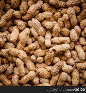 Peanuts seed. Many groundnuts in shells. Peanuts background