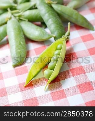 Peapods on a table