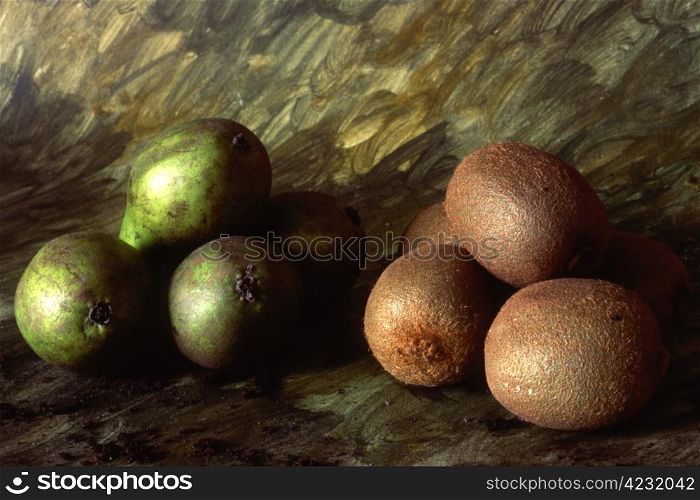 Pear and kiwi siolated on painted background