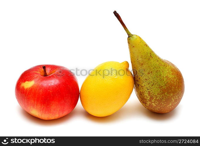 pear lemon and apple in row on white