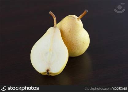pear lying on a wooden table