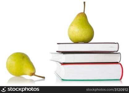 pears and books over a white background