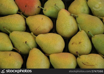 Pears in wooden crates at a market in France