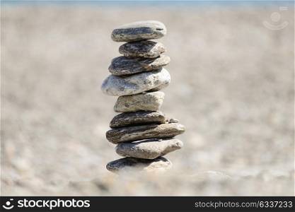 Pebbles in balancing on the sea coast
