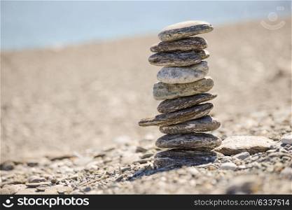 Pebbles in balancing on the sea coast