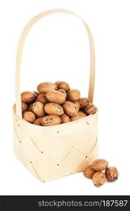 pecan nuts in wooden basket, isolated on white background. Pecan Nuts In Wooden Basket