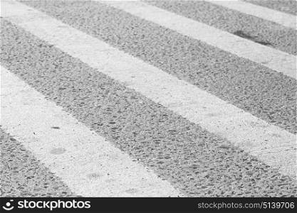 pederastian crossing in asphalt street and abstract background