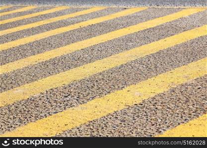 pederastian crossing in asphalt street and abstract background