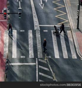                                  pedestrian crossing the crosswalk in Bilbao city, Basque country, Spain