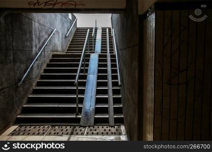 Pedestrian tunnel stairs in Riga, Latvia. Stairs leading out of concrete pedestrian tunnel to the city.