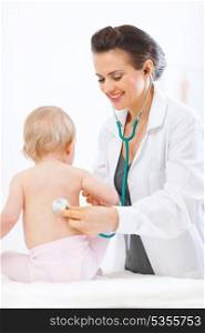 Pediatric doctor examine baby using stethoscope
