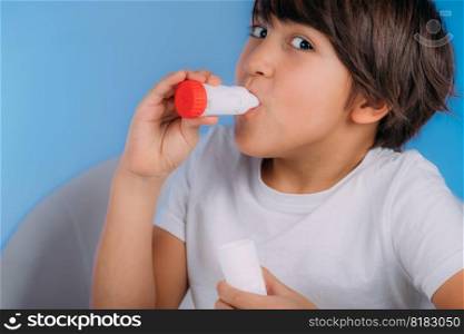 Pediatric pulmonologist helping little boy with aero inhaler. Pulmonologist, medical doctor who specializes in the diagnosis and treatment of diseases and disorders of respiratory system, lungs, bronchial tubes, trachea and structures involving in breathing.. Pediatric Pulmonology, Pulmonologist Helping Little Boy with Inhaler