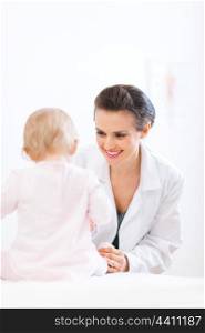 Pediatrician doctor examine baby