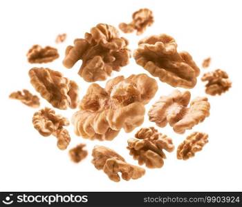 Peeled from the shell, walnut kernels levitate on a white background.. Peeled from the shell, walnut kernels levitate on a white background