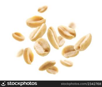 Peeled peanuts levitate on a white background.. Peeled peanuts levitate on a white background