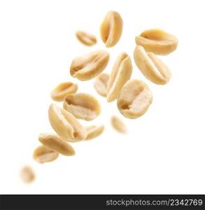 Peeled peanuts levitate on a white background.. Peeled peanuts levitate on a white background