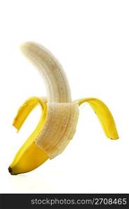 peeled standing banana. one peeled standing banana on white background