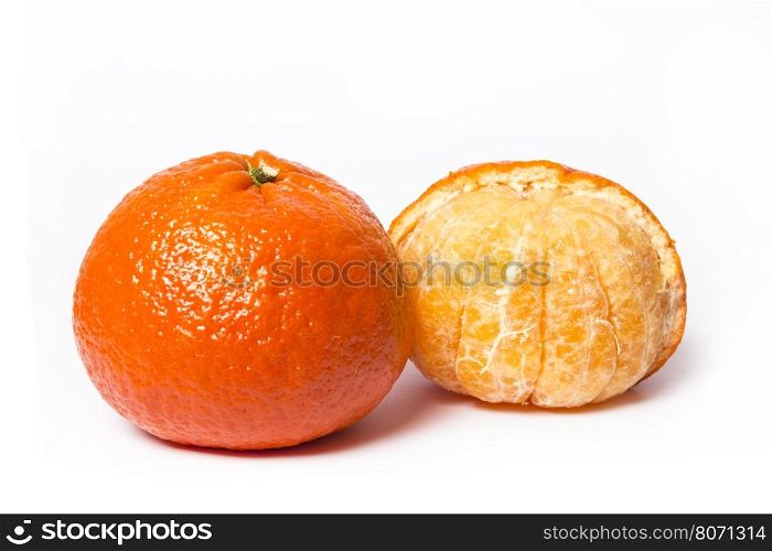Peeled tangerine or mandarin fruit isolated on white background cutout. Mandarin on a white background