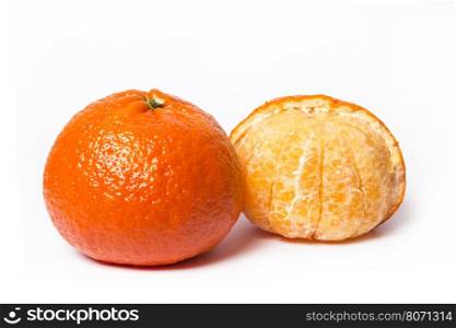 Peeled tangerine or mandarin fruit isolated on white background cutout. Mandarin on a white background