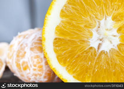 Peeled tangerine while cooking food from tangerines, cooking dessert. Peeled tangerine