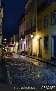 Pelourinho street in Salvador city at night with the facade of old houses illuminated by lanterns. Pelourinho street in Salvador at night