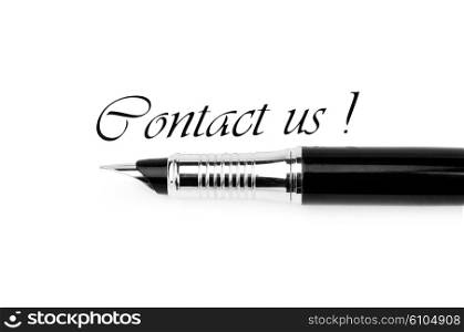 "Pen and "Contact us" message on white"