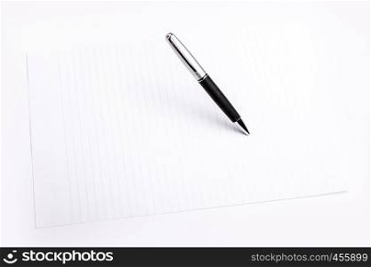 Pen and plain color paper on an isolated background