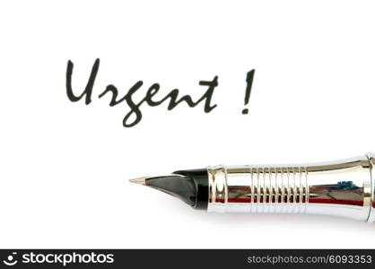 Pen and urgent message - focus on the pen
