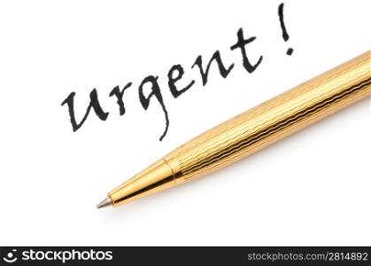 Pen and urgent message isolated on white