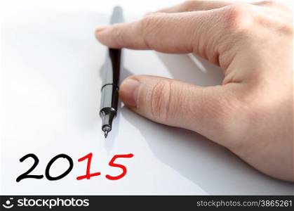 Pen in the hand isolated over white background 2015 concept