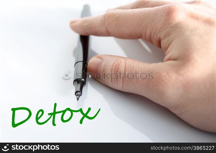 Pen in the hand isolated over white background detox concept