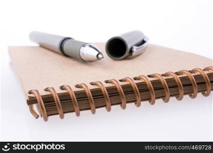 Pen on a spiral notebook