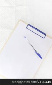 pen white paper clipboard against white background