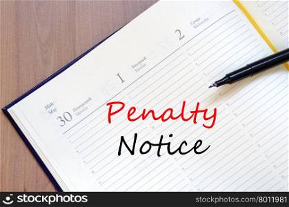 Penalty notice text concept write on notebook