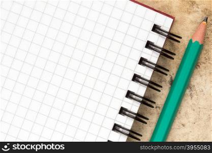 Pencil and blank notebook with copy-space for your text