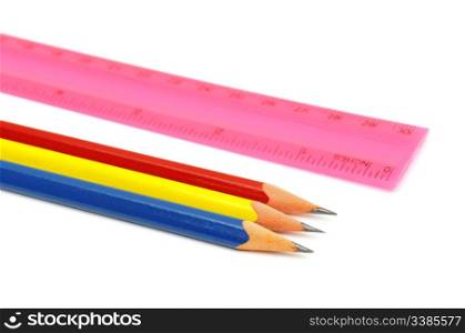 pencil and ruler on white background