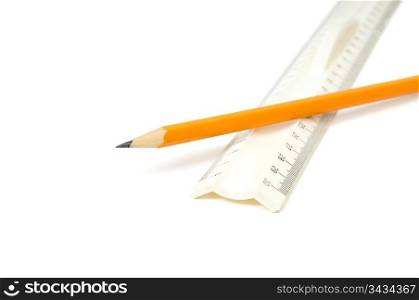 pencil and ruler on white background